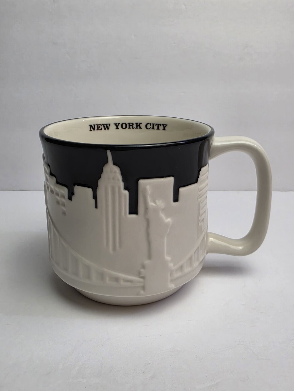 Starbucks New York City 2010 Raised Relief Skyline City Taxi Coffee Mug 16 oz.